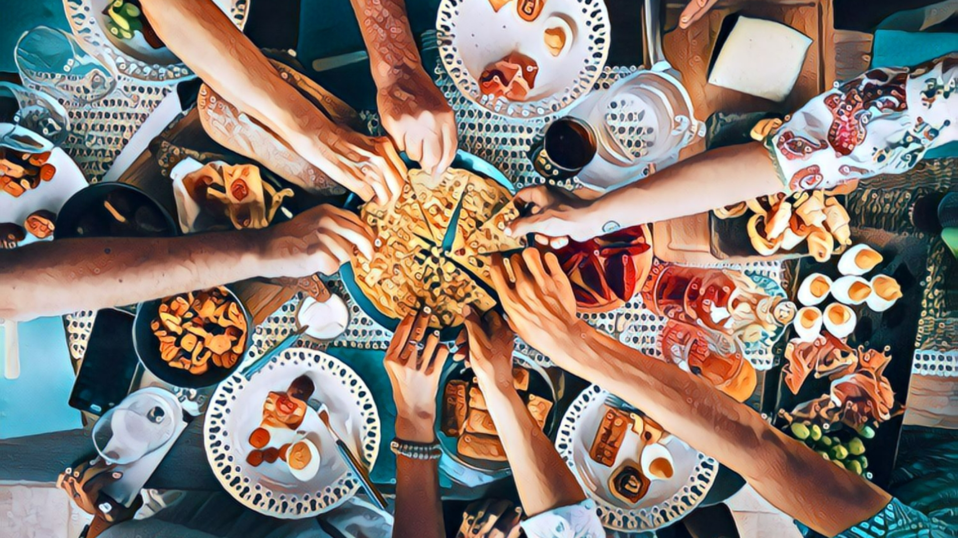 a group of multi-racial, multi-cultural people reaching for their piece of a pis at a dinner table full of food